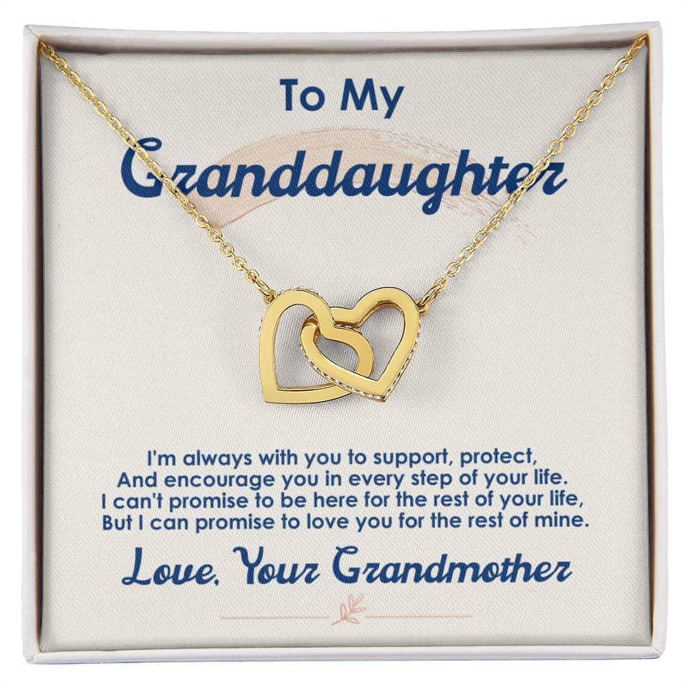 A gold necklace in a box, featuring a heart-shaped pendant symbolizing the bond between a grandmother and granddaughter. Adjustable chain options available.