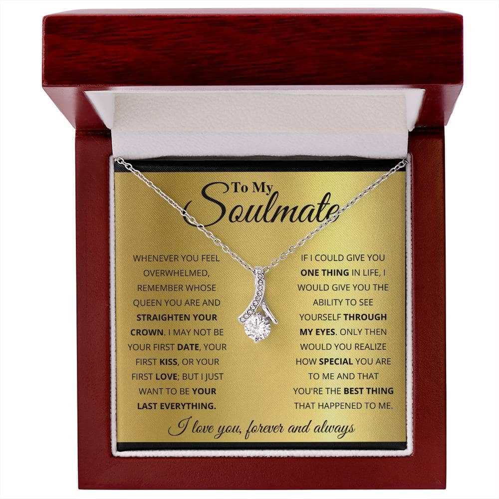 Alt text: "Personalized Soulmate Necklace in box with diamond pendant, symbolizing deep connection and eternal love. Available in white gold or gold finish, customizable with interlocking hearts or love knot design. Presented in a luxurious mahogany-style box with LED lighting."