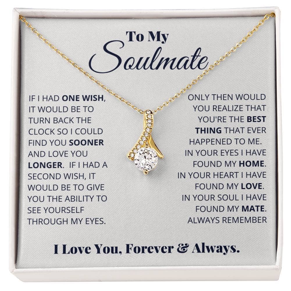 Alt text: "Close-up of a diamond pendant necklace in a box, symbolizing timeless love and commitment"