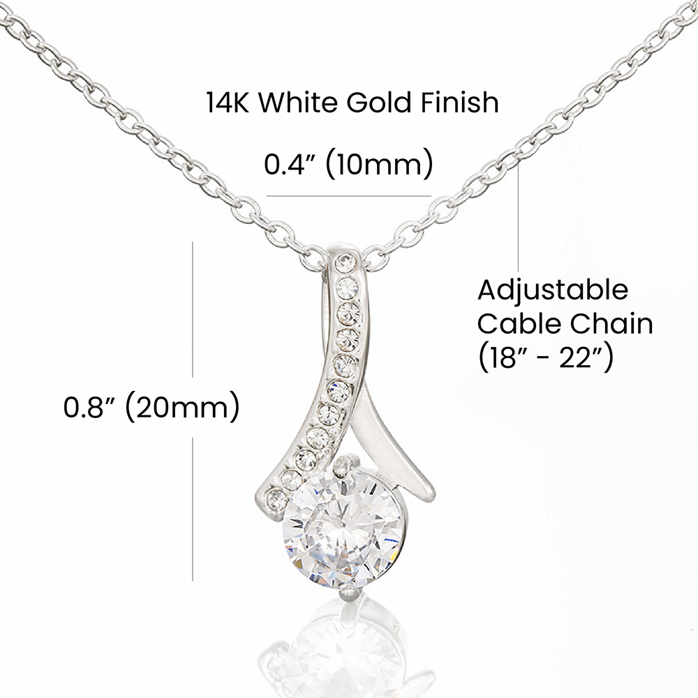 Alt text: "Close-up of a diamond pendant necklace, symbolizing unwavering love and commitment. Crafted with precision, available in white or gold finishes. Tailored fit with adjustable chain. Comes in a luxurious LED lighted gift box."