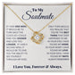 Alt text: "Close-up of Always & Forever Love Knot Soulmate Necklace with interlocking hearts design and cubic zirconia stone pendant in a luxurious mahogany-style box."