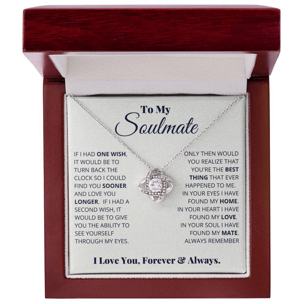 Alt text: "Always & Forever Love Knot Soulmate Necklace in a luxurious mahogany-style box with LED lighting, showcasing a radiant pendant adorned with a 6mm round cut cubic zirconia stone."