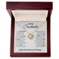 Always & Forever Love Knot Soulmate Necklace - a necklace in a box with a diamond pendant on it, symbolizing an unbreakable bond between two souls. Made with 14k white or 18k yellow gold over stainless steel, adorned with a 6mm round cut cubic zirconia stone. Presented in a luxurious mahogany-style box with LED lighting.