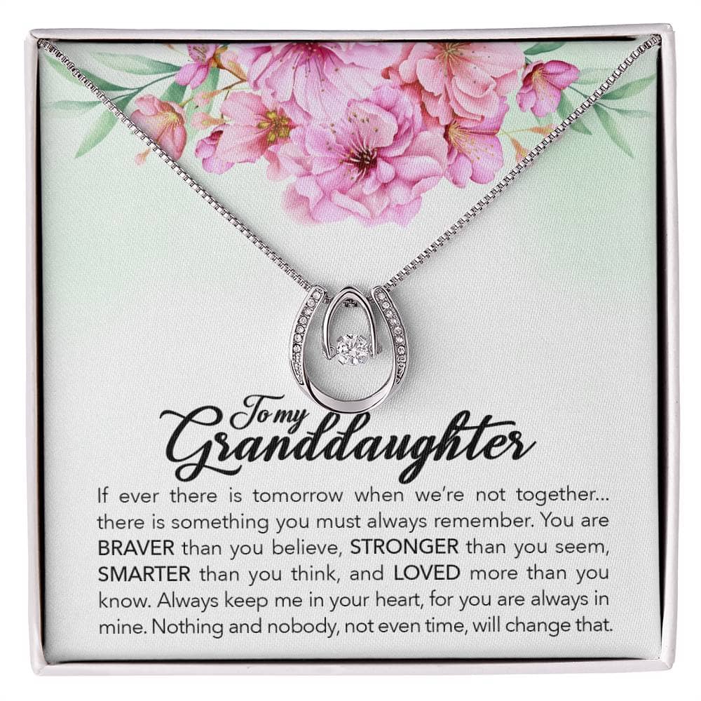 Alt text: "Always in Heart - Personalized Granddaughter Necklace: A necklace in a box with a heart-shaped pendant adorned with cubic zirconia crystals, symbolizing the eternal love between generations."