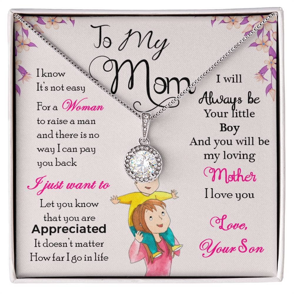 Alt text: "Close-up of a diamond pendant necklace in a box, part of the Always Your Little One - Eternal Hope Personalized Mother Necklace collection by Bespoke Necklace"