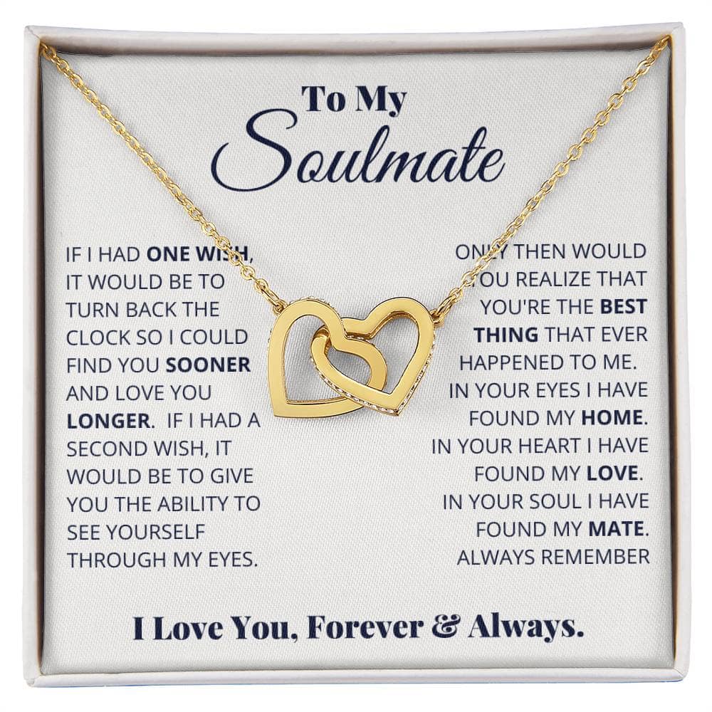 A gold necklace in a box, featuring intertwined hearts and cubic zirconia. Symbol of boundless love, perfect for special occasions or everyday wear. Presented in a luxurious mahogany-style box with LED lighting. A lasting symbol of enduring partnership.