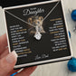 Alt text: "A hand holding the Cherished Bond Personalized Daughter Necklace, a heart-shaped pendant with a cushion-cut cubic zirconia centerpiece, symbolizing the unbreakable bond between parents and daughters."
