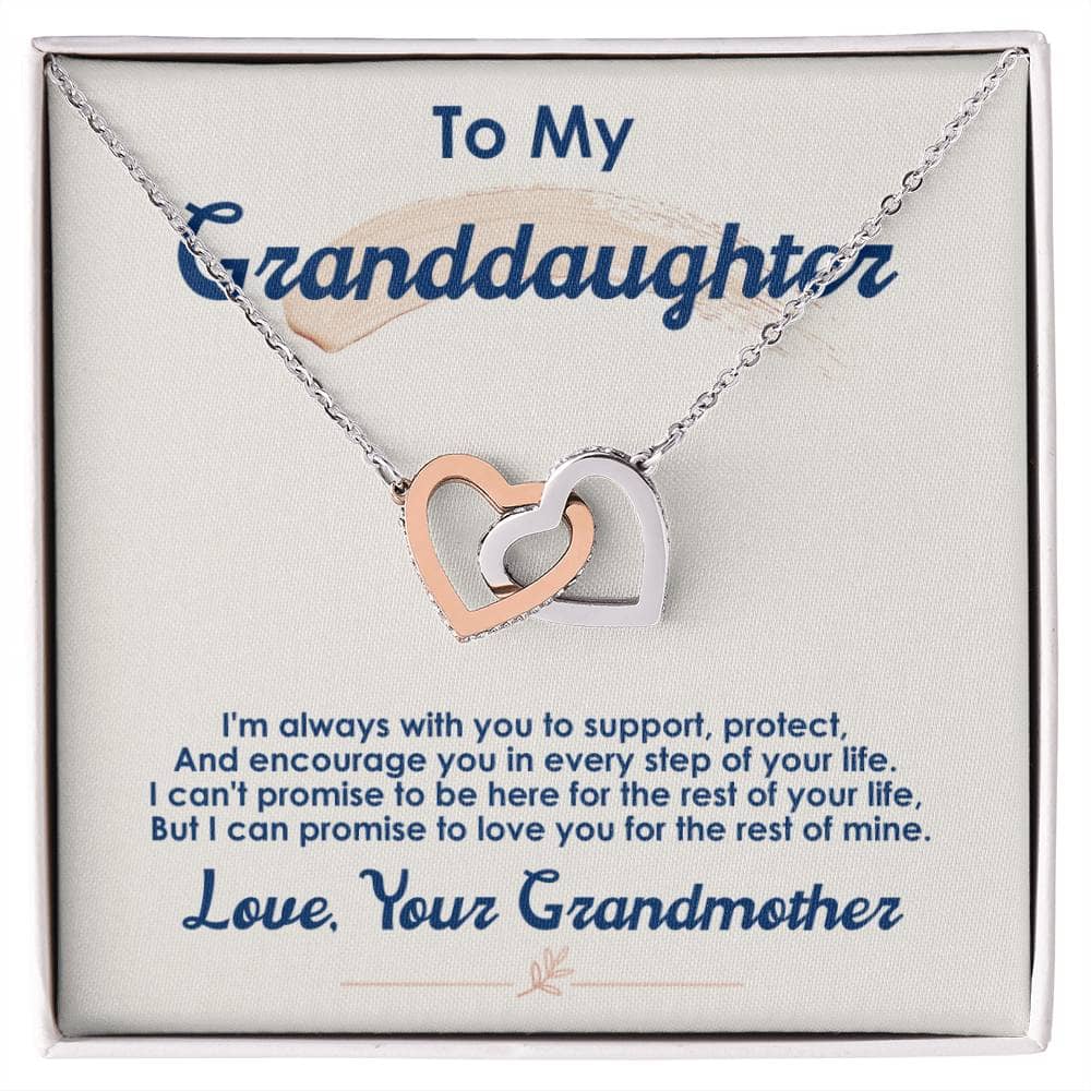 A necklace in a box, featuring a heart-shaped pendant with a cushion-cut cubic zirconia. Adjustable chain options and luxury mahogany-style packaging with integrated LED lighting. Cherished Bond Personalized Granddaughter Necklace.