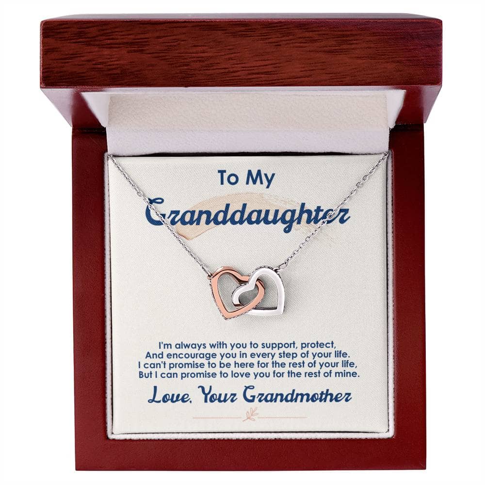 Alt text: "Cherished Bond Personalized Granddaughter Necklace - A necklace in a box, featuring a heart-shaped pendant and adjustable chain. Symbolizes the enduring love between a grandmother and her granddaughter. Luxury packaging with integrated LED lighting."