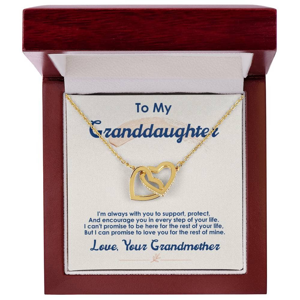 A gold heart necklace in a box, symbolizing the cherished bond between a grandmother and her granddaughter. Adjustable chain options and customizable pendant design. Luxury packaging with integrated LED lighting. Perfect gift for special occasions.
