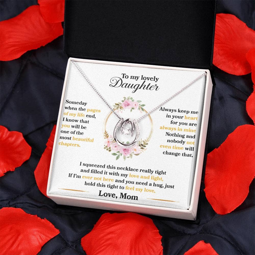 Alt text: "Cherished Moments Personalized Daughter Necklace in a mahogany-style box on a blanket"