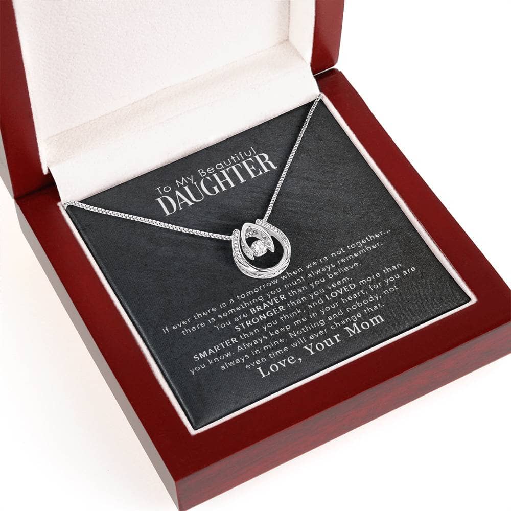 Alt text: "Cherished Personalized Daughter Necklace in a box, featuring a heart-shaped pendant with cubic zirconia. Adjustable chains available. Symbolizes the bond between parent and daughter. Refined craftsmanship and elegant packaging. Perfect for special occasions. From Bespoke Necklace."