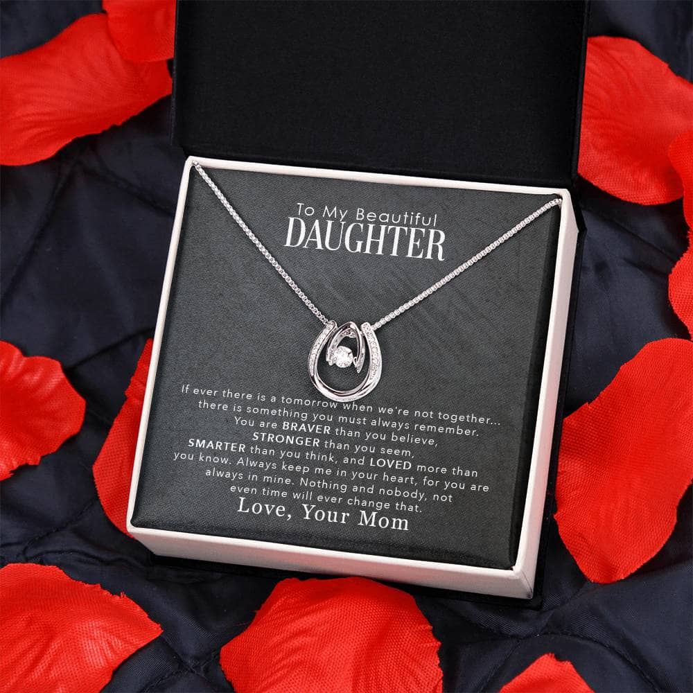 A necklace in a box, symbolizing the bond between parent and daughter. Personalized Daughter Necklace with cushion-cut cubic zirconia and adjustable chains.