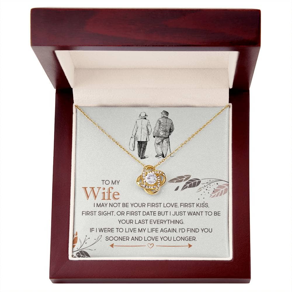 Alt text: "Cherished Personalized Wife Necklace Knot in a box - a symbol of everlasting love and elegance, featuring a captivating heart-shaped pendant and cubic zirconia. Presented in an elegant mahogany-style box with LED light."