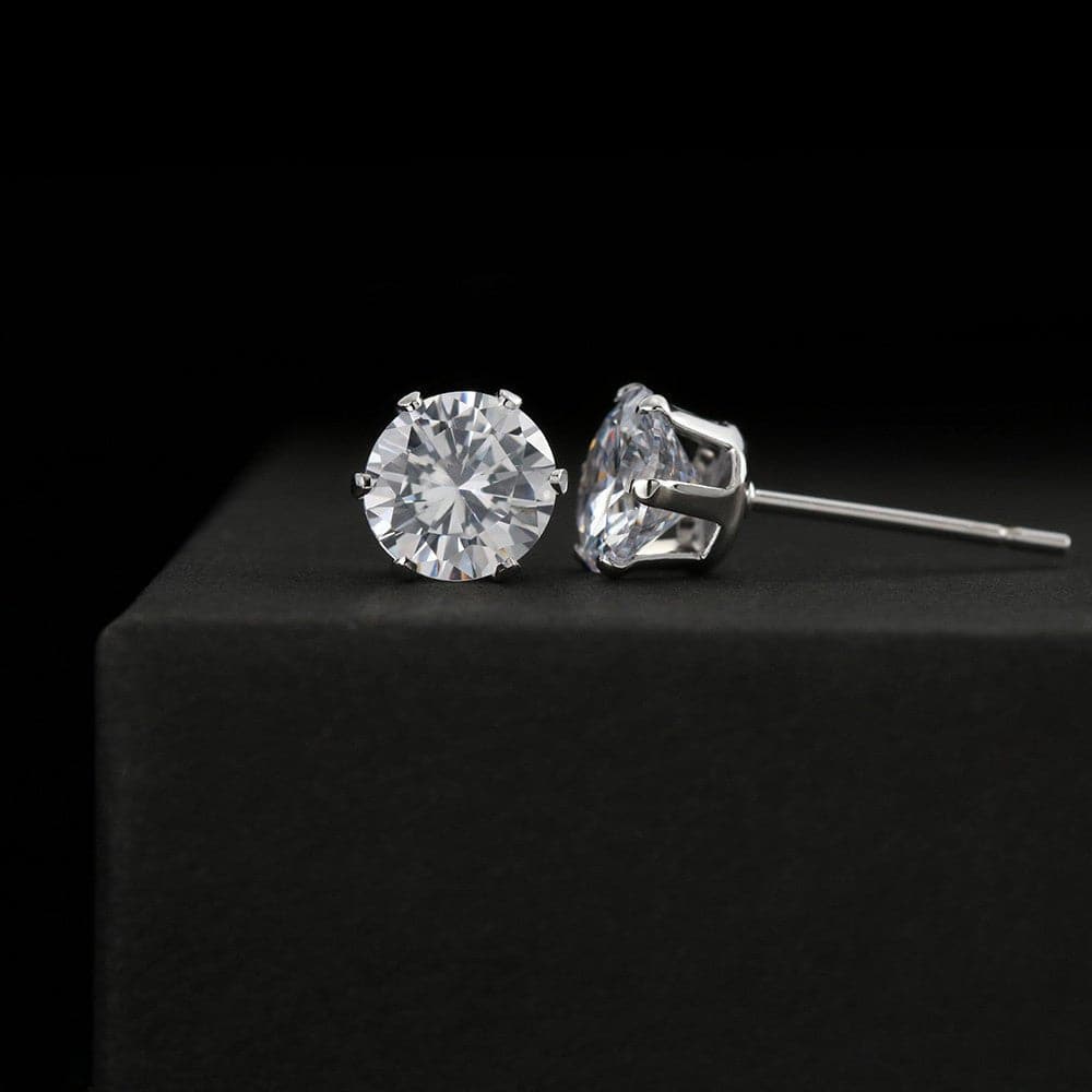 A pair of brilliant 6mm CZ stud earrings in 14K white gold. Elevate your style with these timeless accessories.