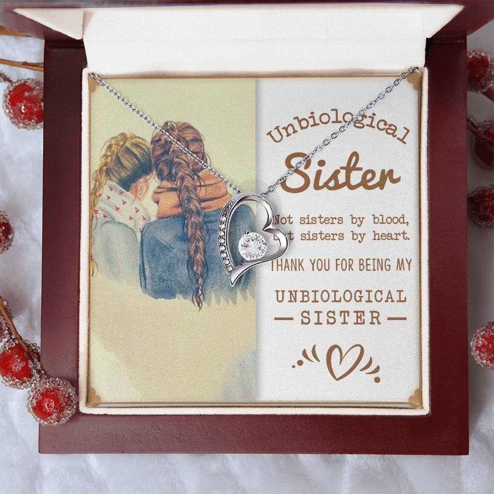 Alt text: "Custom-made Sisters By Heart Cubic Zirconia Necklace in a mahogany-style box with LED lighting"