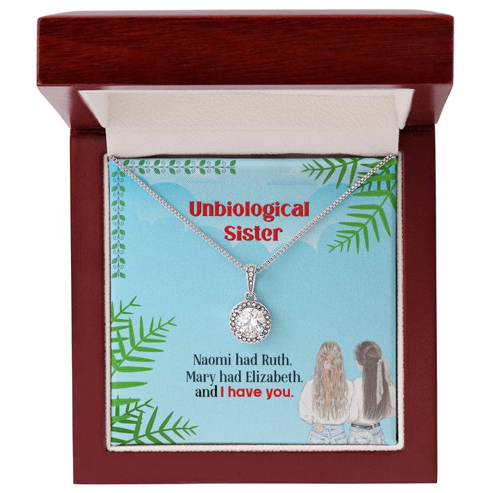 Alt text: "Custom Unbiological Sisters Eternal Hope Necklace - A necklace in a box with a diamond pendant, symbolizing the unbreakable bond between sisters."