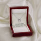 Alt text: "Custom Unbiological Sisters Necklace in box with diamond pendant"