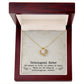A gold necklace with a diamond pendant, symbolizing the unbiological sister bond, elegantly packaged in a mahogany-style box with LED lighting.