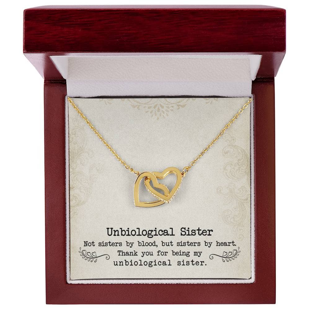 Alt text: "Gold heart necklace in box, symbolizing eternal sisterhood and unbreakable bond. Personalized design with luminescent cubic zirconia. Custom Unbiological Sisters Necklace with Heart Pendant."