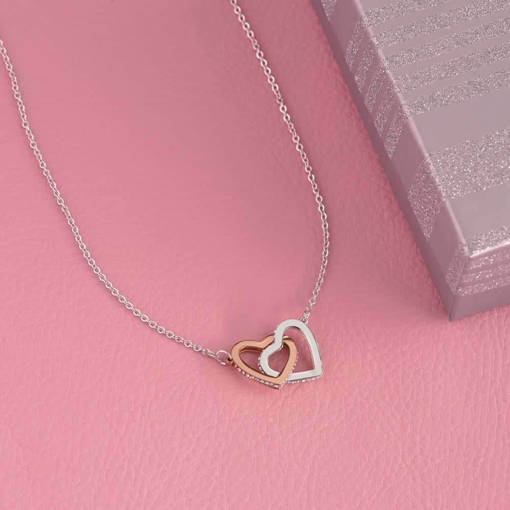 Alt text: "Custom Unbiological Sisters Necklace with Heart Pendant, a heart-shaped necklace on a chain, intertwined hearts design, symbolizing eternal sisterhood."