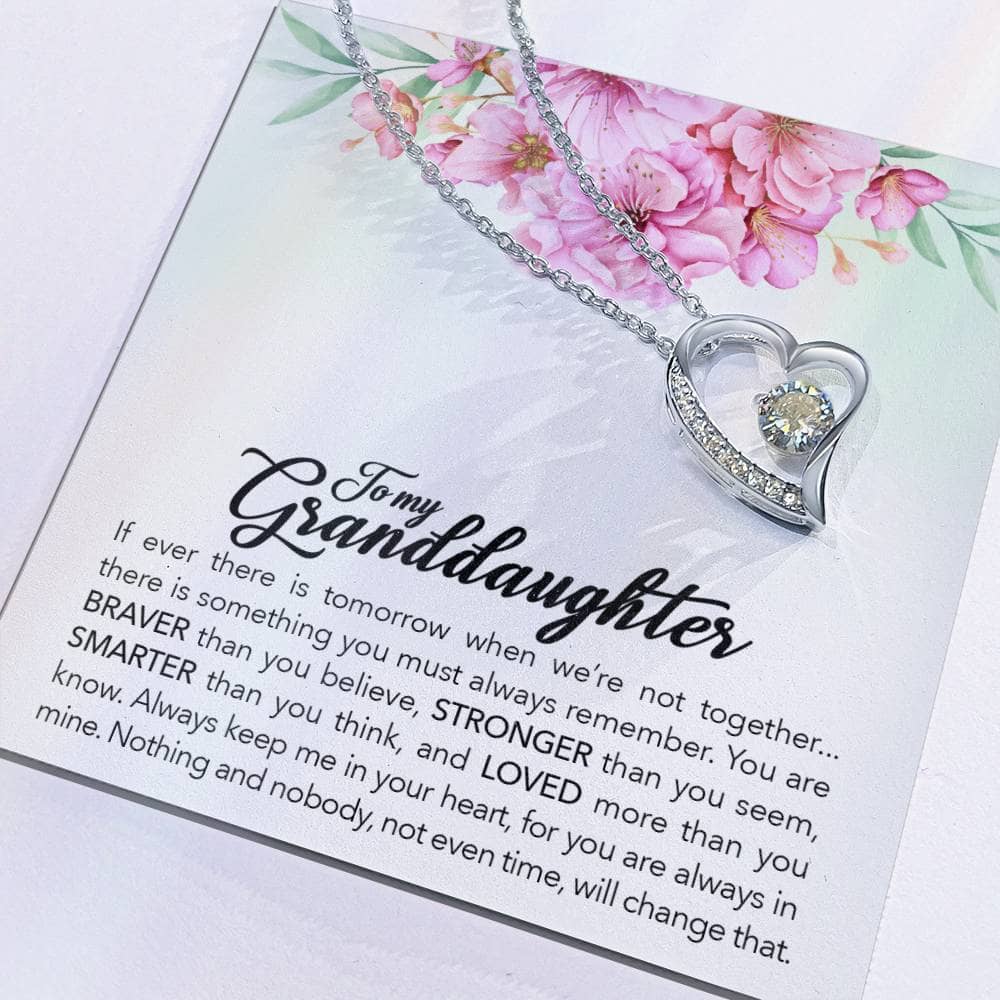 Alt text: "Customized Granddaughter Necklace - Heart-shaped pendant on a card, symbolizing the bond between grandparents and granddaughters. Premium cubic zirconia, adjustable chain, luxurious packaging."