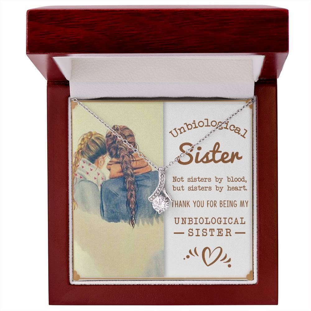 Alt text: "Customized Unbiological Sisters Alluring Charm Necklace in a box, symbolizing an enduring bond between two souls. Available in 14k white gold or 18k yellow gold finish with a sparkling 7mm cushion-cut cubic zirconia. Adjustable length from 18" to 22". Perfect for gifting."