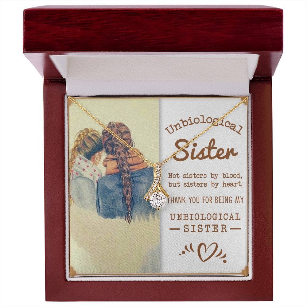 Alt text: "Customized Unbiological Sisters Alluring Charm Necklace - A necklace in a box with two girls hugging, symbolizing a special bond. 14k white gold or 18k yellow gold finish with a 7mm cushion-cut cubic zirconia. Adjustable length from 18" to 22"."