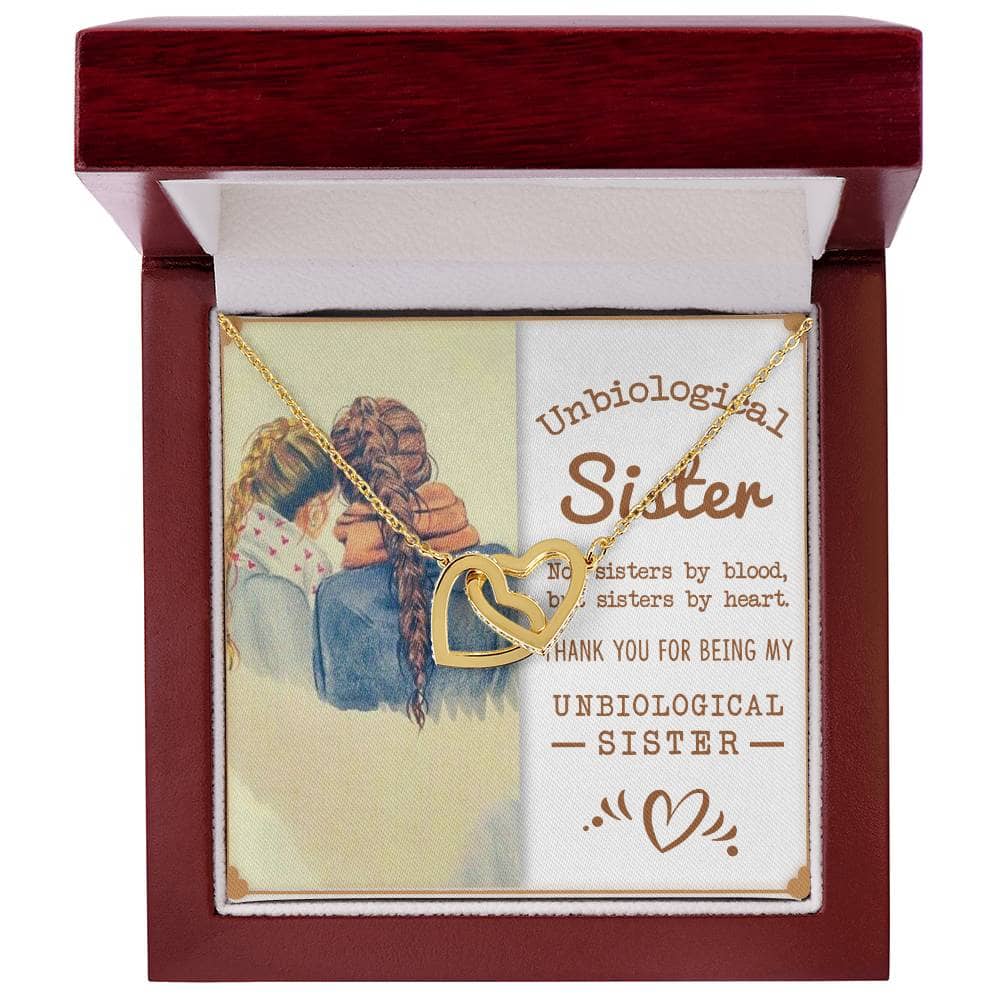 Customized Unbiological Sisters Interlocking Hearts Necklace in a luxuriously styled mahogany box with LED lighting.