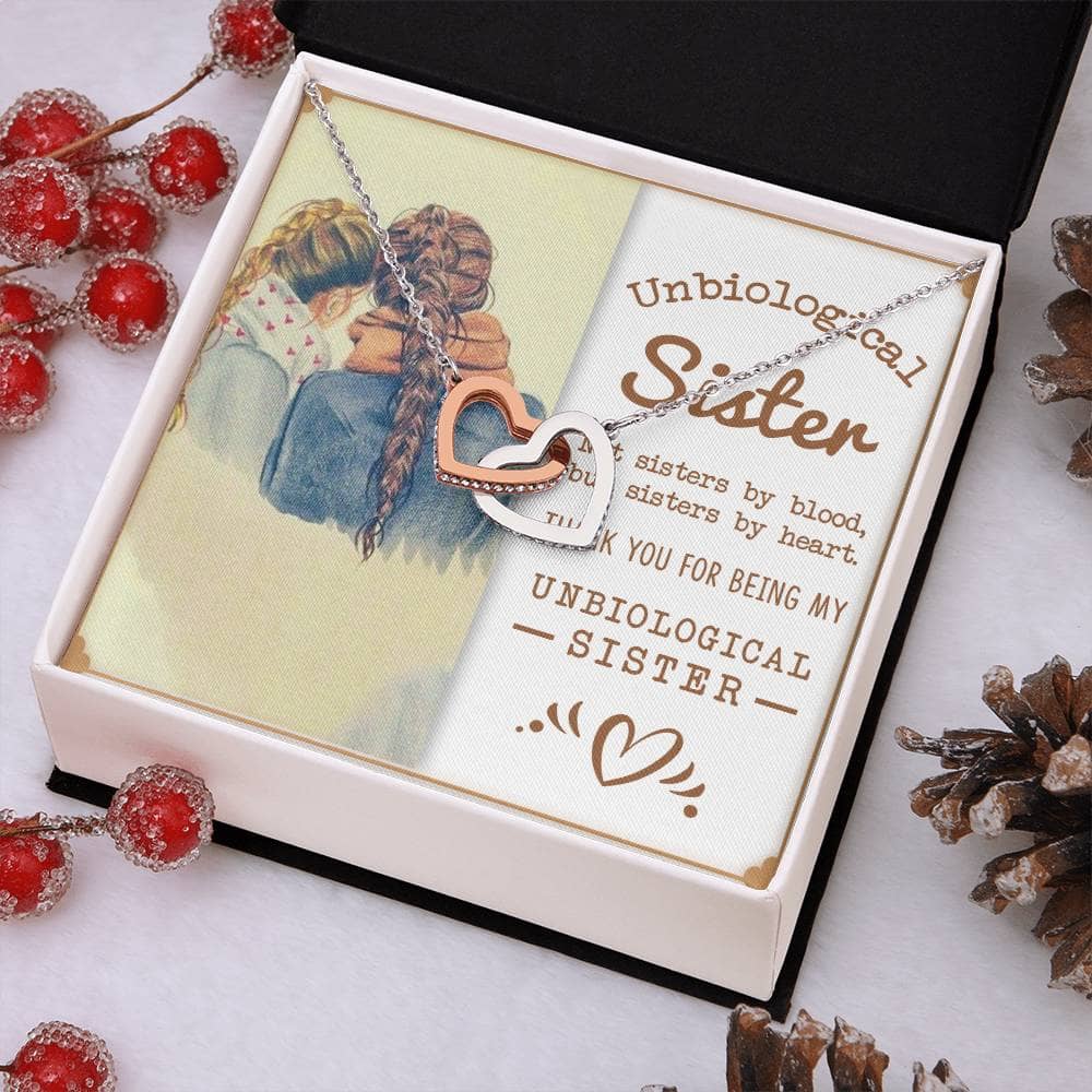 Alt text: "Customized Unbiological Sisters Necklace with interlocking hearts pendant, symbolizing deep sisterly love and connection."