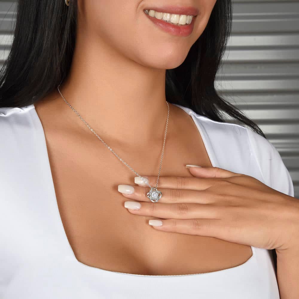 Alt text: "Elegant Personalized Daughter Necklace: A woman wearing a necklace adorned with cubic zirconia, symbolizing an everlasting bond of love between a parent and a daughter."
