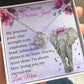 Alt text: "A hand holding the Elegant Personalized Daughter Necklace: For My Precious Jewel, adorned with cubic zirconia, symbolizing an everlasting bond between parent and daughter."