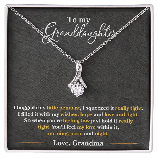 Alt text: "Elegant Personalized Granddaughter Necklace with Heart Pendant in a box"