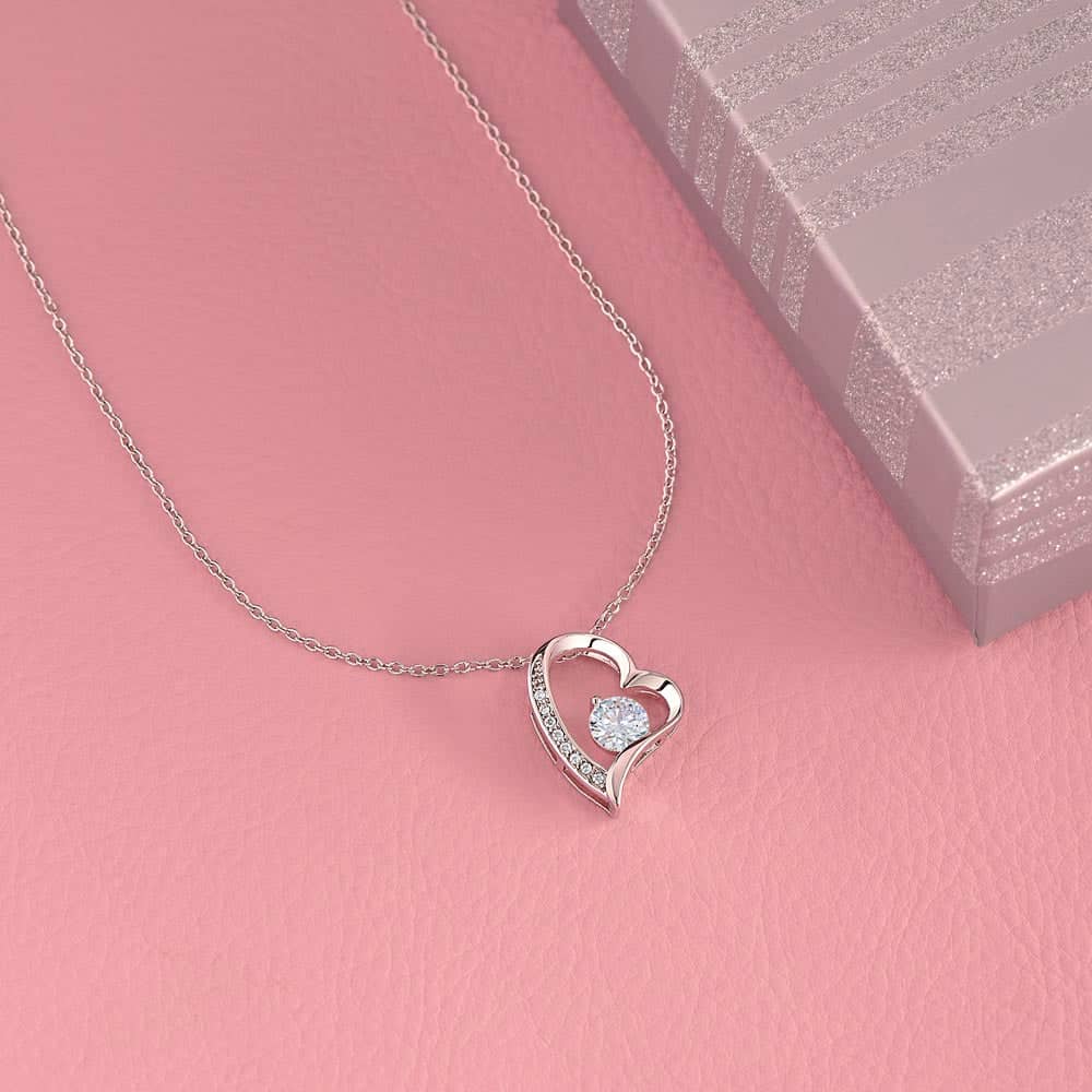Alt text: "Elegant Personalized Wife Necklace with Heart Pendant & Adjustable Chain - A necklace with a heart pendant on a chain, symbolizing everlasting love and shared moments. Crafted with 14k white gold and cubic zirconia for lasting durability and elegance. Perfectly packaged in a luxurious box for gifting. Limited stock available!"