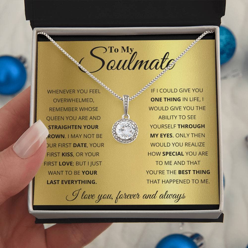 Alt text: "Hand holding Eternal Hope Necklace in a box"