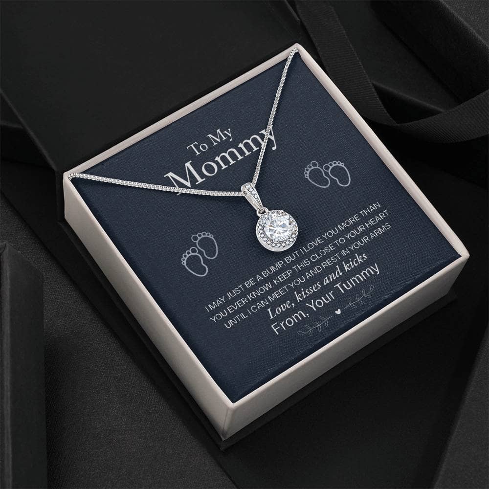 Alt text: "Personalized Mother Necklace in a box with cushion-cut cubic zirconia stones, symbolizing the bond between mothers and children."