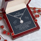 Alt text: "Personalized Mother Necklace in a box with red berries, a heartfelt gift from kids, symbolizing the strong bond between mothers and children."
