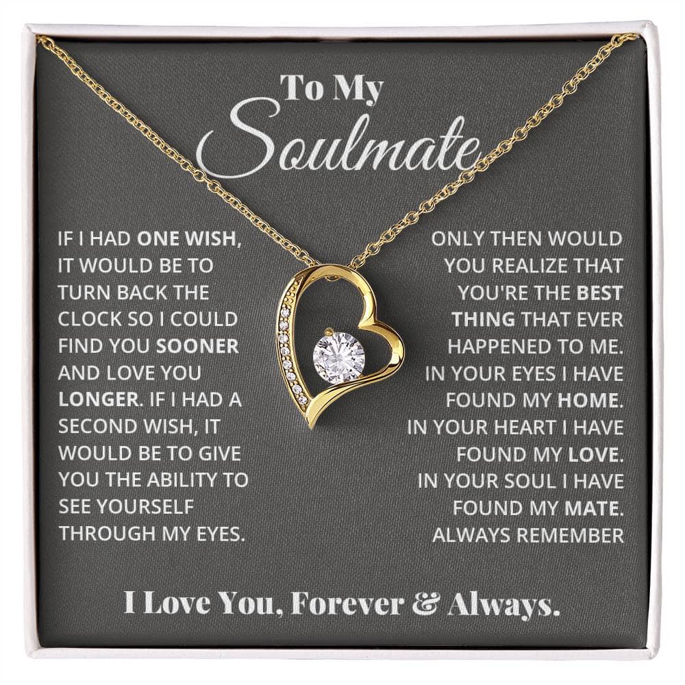 Alt text: "Eternal Love Necklace - A heart pendant with a diamond-like crystal, adorned by tiny crystals, on a flexible chain. Symbolize your enduring bond with this captivating necklace. Perfect for gifting."
