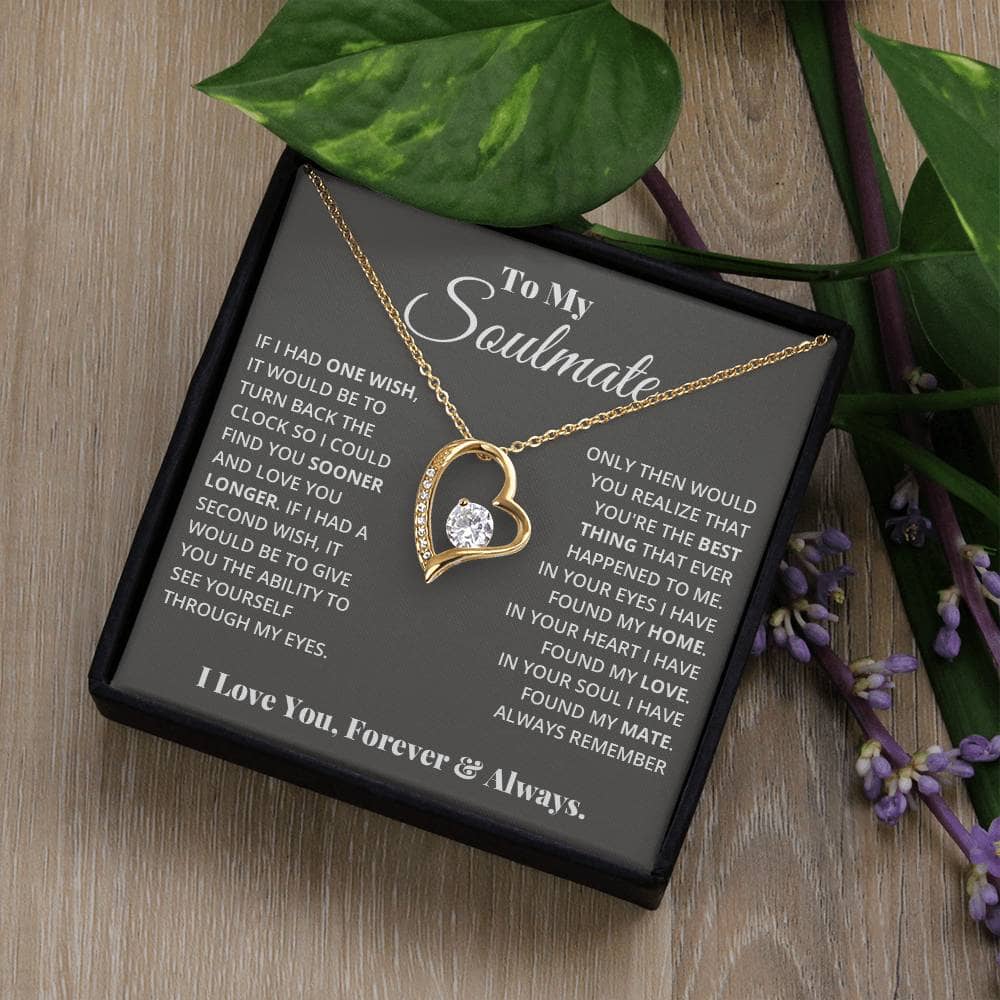 Alt text: "Eternal Love Necklace - A heart pendant with a sparkling CZ crystal centerpiece, adorned with tiny crystals, symbolizing enduring romance and soulful connection. Perfect gift for your soulmate."
