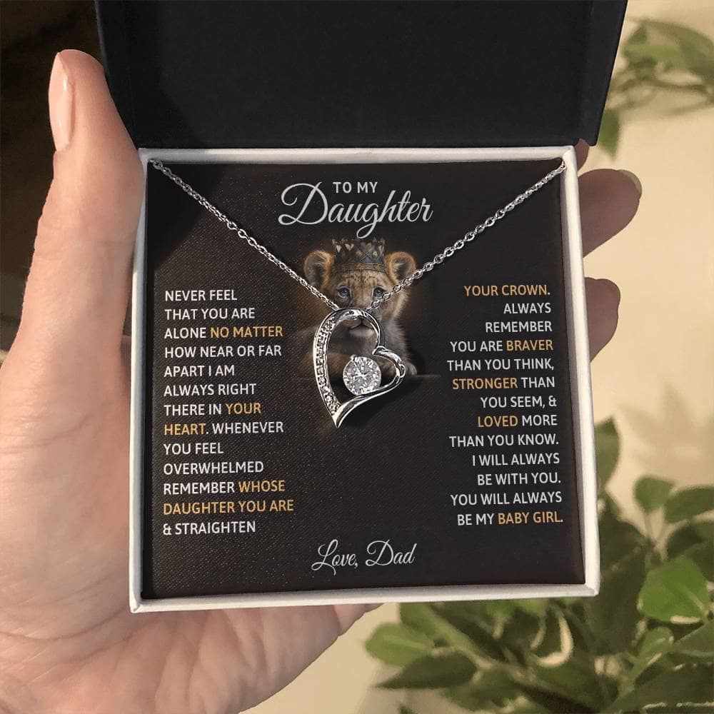 Alt text: "Hand holding Eternal Love Personalized Daughter Necklace in box"