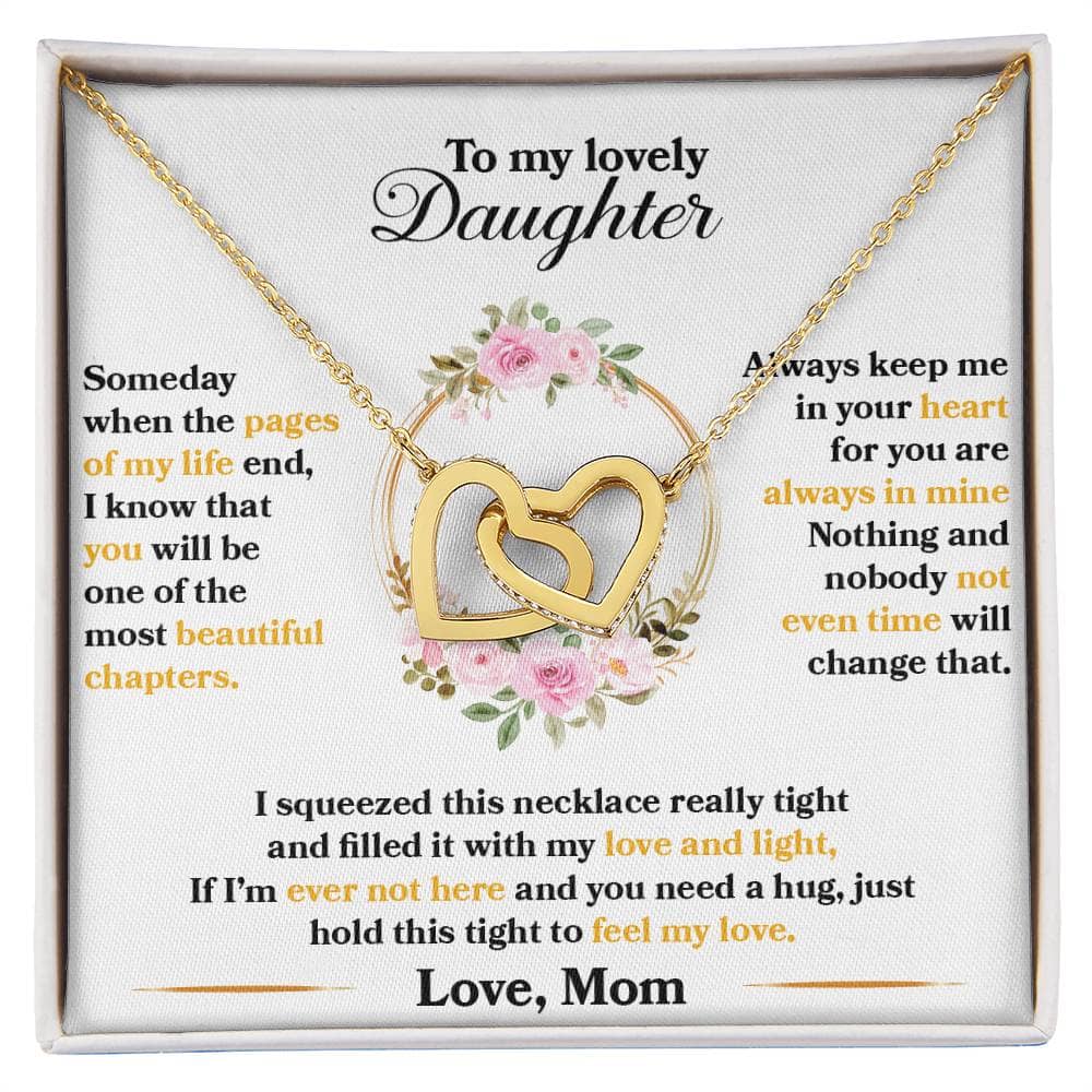 Alt text: Exquisite Personalized Daughter Necklace with Interlocking Hearts, adorned with CZ crystals, in a mahogany-style box with LED lighting.