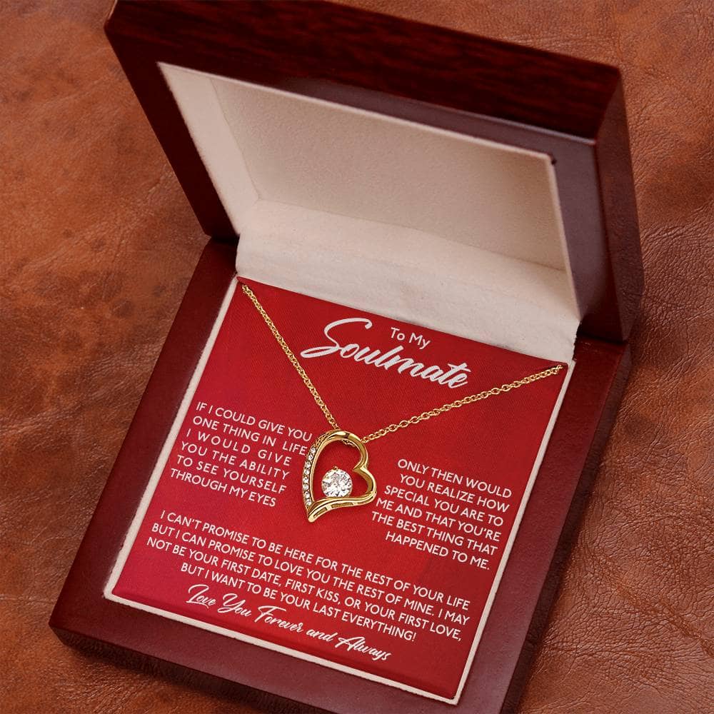Alt text: "Forever Love Necklace - a gold heart necklace with a diamond in a box, symbolizing enduring love and commitment."