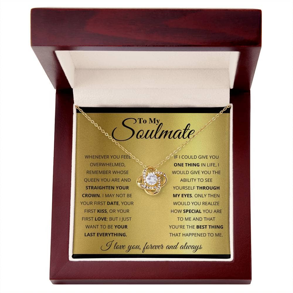 Alt text: "From Me to My Soulmate" Unique Love Knot Necklace in a box, featuring a gold pendant with a diamond-like stone.