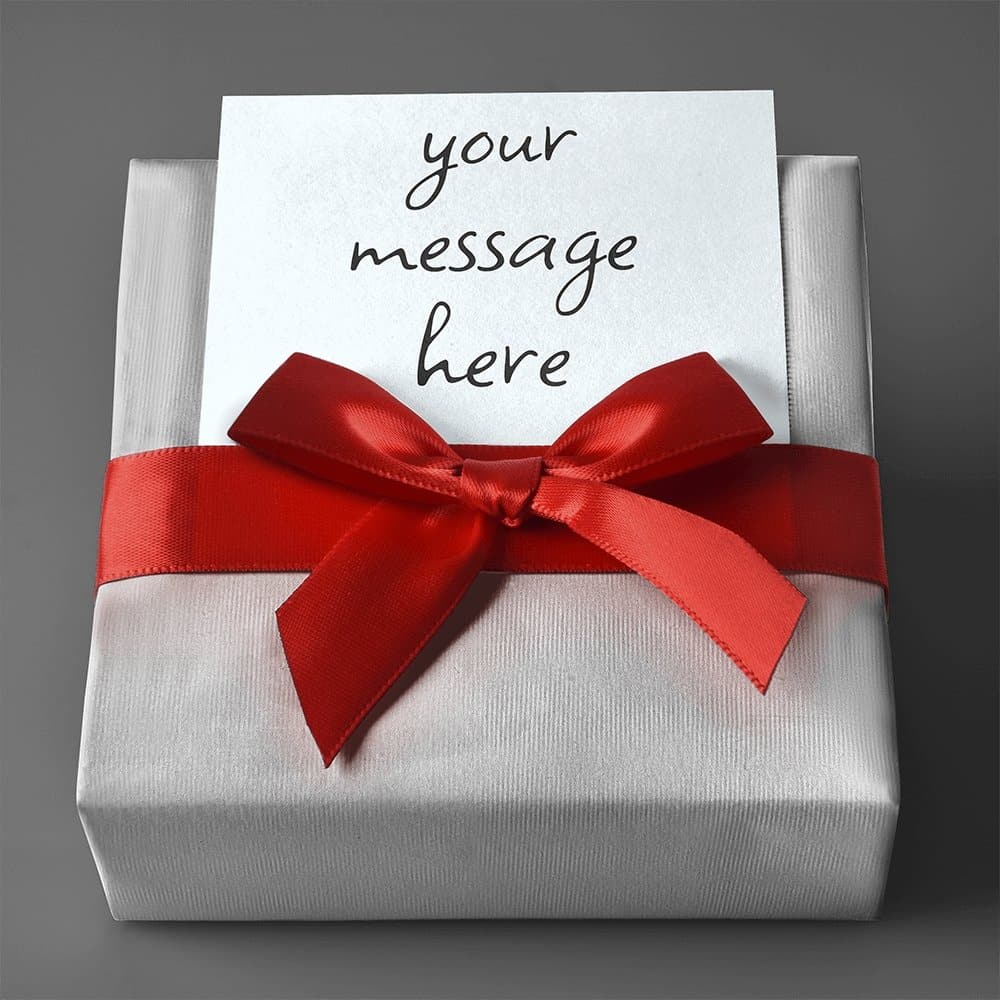 A gift box with a personalized note and a red ribbon, perfect for adding a special touch to your purchase. Gift Wrap with Personalized Message.