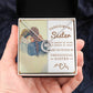 Alt text: "Hand holding Heartfelt Unbiological Sisters Custom Necklace in box"