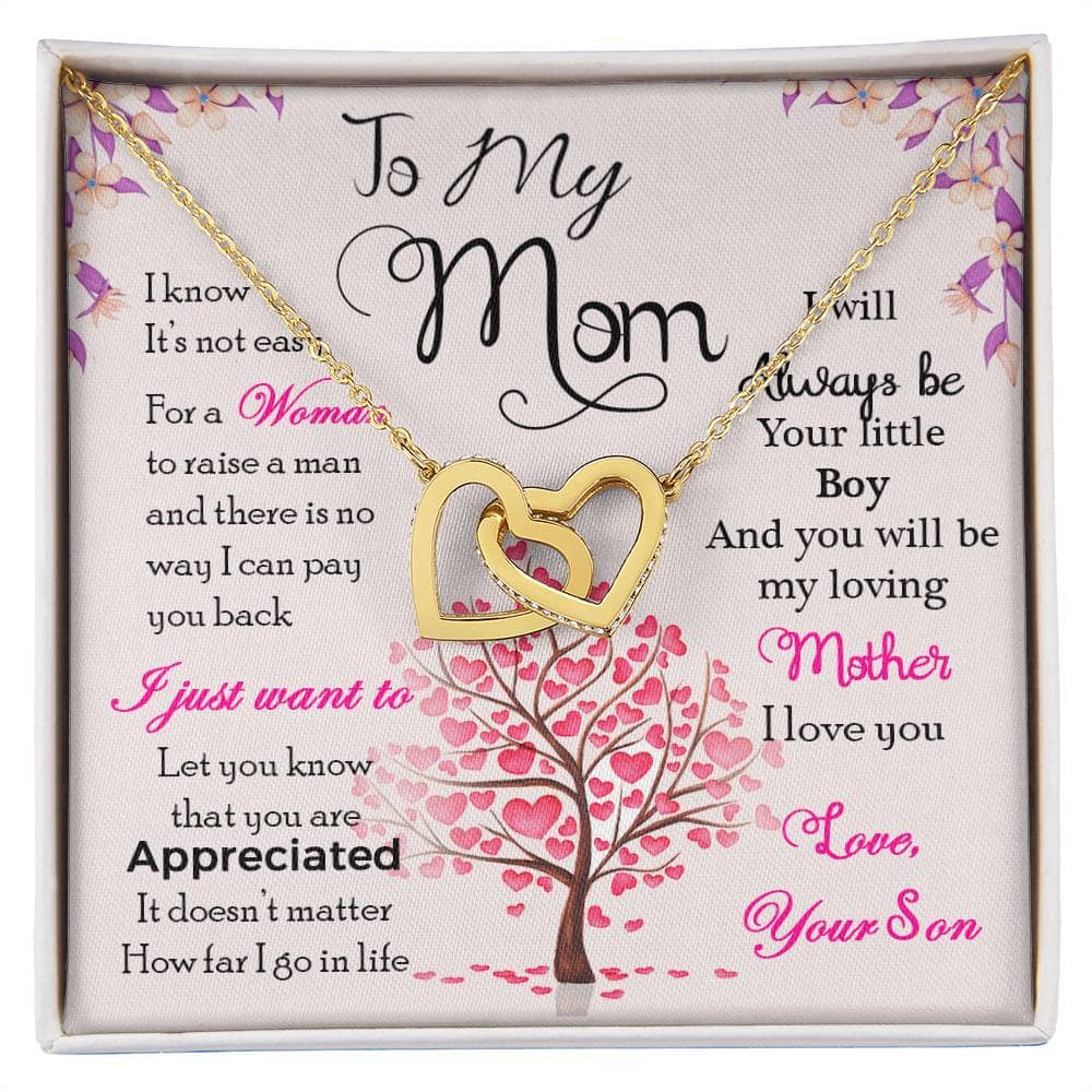 A high-quality personalized mother necklace featuring a delicately designed heart-shaped pendant adorned with cushion-cut cubic zirconia. Symbolizing the everlasting bond between a mother and her child, this necklace comes with adjustable cable or box chains for a custom fit. Presented in a deluxe mahogany-style gift box with LED lighting, it's the perfect sentimental present for any occasion.