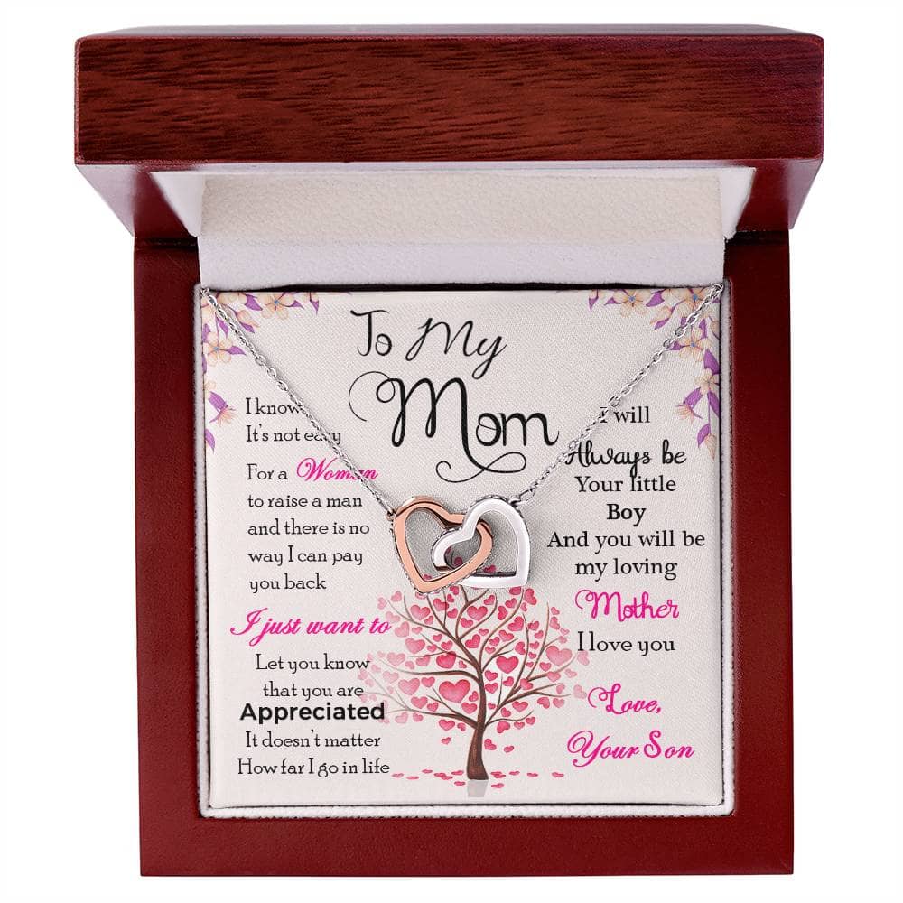 Alt text: "High-Quality Personalized Mother Necklace in a box, adorned with cubic zirconia, symbolizing the everlasting bond between a mother and child."