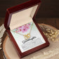 Interlocking Hearts Personalized Granddaughter Necklace in a box, featuring a heart-shaped pendant symbolizing the everlasting love between grandparents and granddaughters.