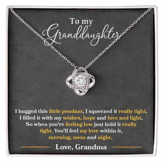 Alt text: "Close-up of Personalized Granddaughter Necklace in box with diamond pendant"