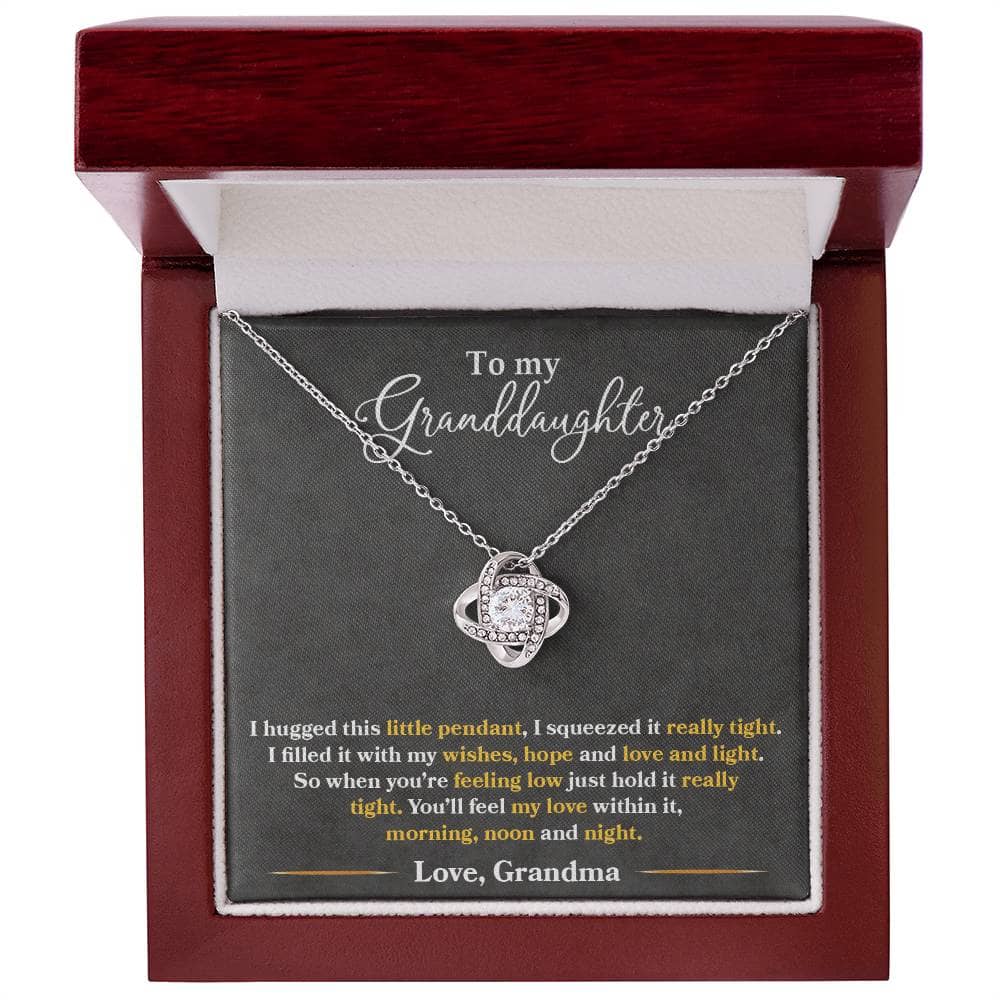 Alt text: "Personalized Granddaughter Necklace in a box, featuring a heart-shaped pendant and an adjustable chain."